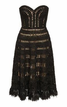 a black dress with fringes on the waist and shoulders, it is made from croche