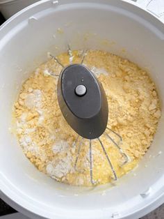 a food processor filled with batter and eggs