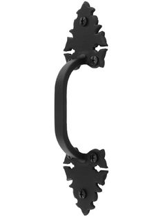 an ornate black door handle on a white background with clippings to the left