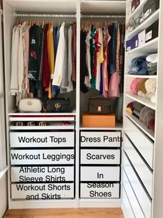 an organized closet with white drawers and lots of clothes