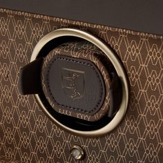 Step into a world of unparalleled sophistication and innovation with the Earth Double Coffee Watch Winder from the distinguished 190th anniversary collection. This exquisite piece melds cutting-edge design with a commitment to sustainability. Enveloped in a lush apple leather exterior, complemented by sleek matte metallic hardware, the watch winder exudes a timeless appeal. The interior is adorned with recycled jacquard silk, showcasing the iconic WOLF signature pattern, which speaks to the bran Police Jewelry, G Shock Men, Bluetooth Watch, Apple Leather, D1 Milano, Tw Steel, Watch Winders, Seiko Presage, Watch Winder