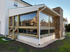 an outside view of a house with some windows