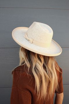 This gorg oatmeal hat goes with everything and is extremely elevated! It's such a good high quality material and has an adjustable string inside to fit everyone! A closet staple if you ask me! Heather beige and nude Adjustable inside string Fedora hat style Bow detail Lifted edge of brim True to size One size Winter Beige Flat Brim Fedora, Wide Brim Beige Felt Hat For Winter, Beige Wide Brim Felt Hat For Winter, Beige Winter Fedora Hat, Beige Fedora Winter Hat, Beige Wide Brim Fedora For Winter, Beige Boater Hat With Flat Brim For Fall, Beige Fedora With Flat Brim For Fall, Beige Flat Brim Boater Hat For Fall