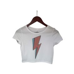 This faded distressed David Bowie Lighting Bolt Band Tee crop top is perfect to dress up or wear casual. The image is sublimated onto the material making the top buttery soft! Fabrication: 52% Airlume combed and ring-spun cotton 48% poly, 40 single 3.6 oz. David Bowie Lighting Bolt Band Tee Vintage Retro Distressed Crop Top, Short Sleeve Crop Top, Crop Top for Women, Boho Hippie Clothing, 90s Fashion Distressed Crop Top, 80s Crop Top, Vintage Band T Shirts, Crop Top Short Sleeve, Lighting Bolt, Hippie Clothing, 80s And 90s Fashion, Vintage Band Tees, Short Sleeve Crop Top