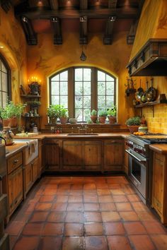 a kitchen with an arched window and tile flooring is shown in this image, there are potted plants on the windowsill