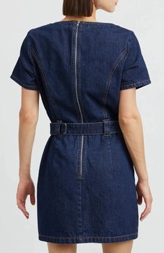 Get ready for a playful summer in the EN SAISON June Denim Mini Dress! With a belted waist, princess seams, and an exposed back zipper, this dress is both flattering and functional. The square neckline and short sleeves add a touch of retro charm. Perfect for sunny days or warm nights. **Sizing notes: True to size. XS=0-2, S=4-6, M=8-10, L=12-14. 33" length - taken from size S. MATERIALS: 100% Cotton CARE: Hand wash. Line dry. Denim Styling, Resort Accessories, Levis Outfit, Denim Chic, Skirt Jumpsuit, Indigo Denim, Lifestyle Trends, Life Of The Party, Denim Mini Dress