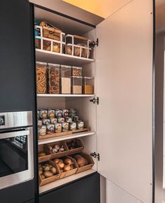 an open pantry with lots of food in it