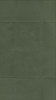 an empty piece of green paper on a white background