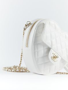 Chanel Heart Bag Large in White Lambskin with Gold Hardware & leather looped crossbody chain. Un & 100% d. Supplied with Chanel box, dustbag, ribbon and ation microchip. Dimensions: 16.5 × 18 × 6.5 cm DETAILSLambskinGold HardwearLarge16.5 × 18 × 6.5 cmNeed assistance? Use our Sourcery service or speak to a member of our team via WhatsApp Chanel Heart Bag, White Hardware, Chanel Box, Heart Bag, Chanel Model, Vuitton Bag, Champagne Gold, White Bag, Lambskin Leather