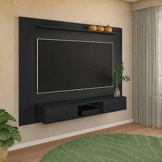 a flat screen tv mounted to the side of a wall in an empty living room