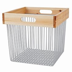 a wooden and metal basket with handles