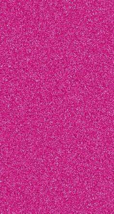 a bright pink background with small speckles