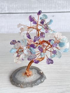 Item name : Rose Quartz/amethyst/aquamarine Crystal tree , around 3 inch ~4 inch tall  It is made of natural crystal and agate    I accept payment via PayPal .  2~4 weeks  You items will be packed very carefully for safety shipment. I will provide tracking number to you after shipment arranged  I accept payment via PayPal .  ---Shipping Charge Shipping charge : include local handling and packing fee. Shipping Discount : we provide discount shipping charge for each additional item according to it Tree Wedding Decor, Crystal Chips, Crystal Tree, Aquamarine Crystal, Tree Wedding, Quartz Rose, Crystal Gifts, Healing Crystal, Natural Crystals