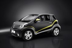 the small car is painted black and yellow