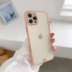 a person holding an iphone case in their hand