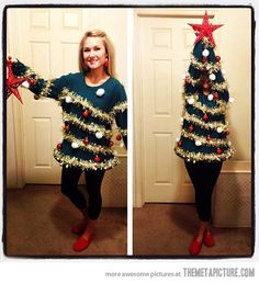 a woman in a christmas tree costume is taking a selfie