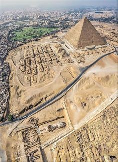 an aerial view of the pyramids and roads in egypt