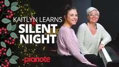 two women sitting next to each other in front of a christmas tree with the words silent night on it