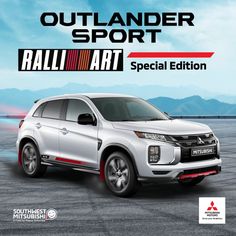 the front end of a white car with red stripes and an outlander sport logo on it