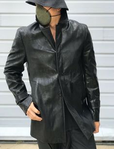 CoSTUME NATIONAL HOMME Vegan Leather Jacket Made in Italy Color - Black Size - 52 (see photos for exact measurements). Model in the photos is 6 ft tall, 185 lbs. This stylish jacket is in great condition. It’s got some signs of wear on the fabric and couple discoloration spots; missing top button. Please ask all the questions prior to purchasing or sending an offer! ABSOLUTELY NO RETURNS! Payment is due within 48 hours after the end of the listing. Thank you for your interest. Black Single Breasted Outerwear With Stand Collar, Black Single-breasted Outerwear With Stand Collar, Tailored Leather Outerwear With Concealed Placket, Casual Leather Outerwear With Notch Lapel, Fitted Leather Jacket With Stand Collar For Streetwear, Fitted Stand Collar Business Outerwear, Fitted Business Outerwear With Stand Collar, Fitted Outerwear With Stand Collar For Business, Black Stand Collar Business Outerwear