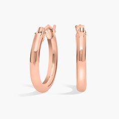 A style essential, these petite hoop earrings are crafted from 14k rose gold tubing for a polished, lightweight look, finished with a latch back closure. Classic 14k Rose Gold Huggie Earrings, Classic Rose Gold 14k Huggie Earrings, Classic Small Hoop Rose Gold Huggie Earrings, Classic Rose Gold Small Hoop Huggie Earrings, Classic Rose Gold Huggie Hoop Earrings, Minimalist Rose Gold Huggie Earrings For Formal Occasions, Classic Rose Gold Huggie Earrings For Formal Occasions, Classic Rose Gold Huggie Earrings, Formal Rose Gold Tarnish Resistant Huggie Earrings