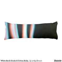 a black and white striped pillow on a white background