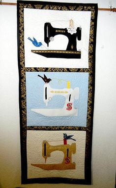 a wall hanging with sewing machines on it