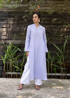 With a simple combination of our long tunic tops CATHLEEN and wide-leg pants, you'll have a linen ensemble that's  elegant, comfortable, and fashionable. Handcrafted in our studio to your specific measurements and customization preferences, with a wide range of color options.  ✓DETAILS - Loose fit - V-neck - Long sleeves - Zipper on back - High side splits - Pants: loose fit, wide legs, front zipper, plastic band at the back for comfort and flexibility. - 100% linen, medium weight, free-shrinkag Summer Straight Kurta With Set-in Sleeves, Spring Linen Straight Kurta Set, Spring Sets With Side Slits, Summer Linen Straight Kurta Set, Summer Linen Sets With Straight Kurta, Linen Straight Kurta Set For Summer, Straight Kurta With Set-in Sleeves For Spring, Summer Linen Straight Kurta, Spring Linen Long Sleeve Kaftan