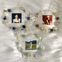 four different pictures are attached to a silver chain with glass beads and charms on it