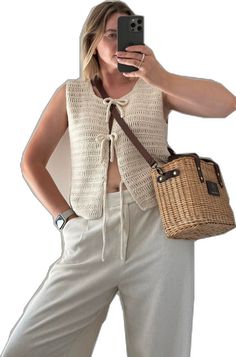 Chic Beige Knit Vest, Chic Spring Crop Top Vest, Chic Fitted Sweater Vest For Summer, Summer Beige Knitted Top, White Cotton Sweater Vest For Summer, Chic Cotton Knitted Tops, Chic Knitted Cotton Tops, Trendy Cotton Crochet Top For Fall, Trendy Crochet Lace Tops For Spring