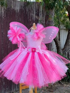 Welcome to Baby/Infants Clothing  by Funkids&Us Boutique Magic Pink  Fairies tutu dress   Everyone dream to be a   fairy ` This tutu  dress is super cute and adorable it is perfect for  birthdays, photographs, Halloween party  or everyday dress up.dress up!  This tutu dress is made premium tulle of hot pink and pink with glitter pink tulle . Dress is made of pink crochet tutu top embellishment  of gorgeous flowers. The tutu skirt part is a mix color combination of tulle in hot pink and pink colo Cheap Pink Tutu Dress For Summer, Cheap Pink Spring Tutu Dress, Cheap Pink Princess Tutu Dress, Cheap Pink Tulle Tutu Dress, Fotos Halloween, Pink Fairies, Fairy Headband, Tutu Top, Crochet Tutu