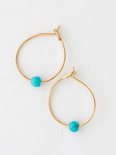 They're so cute & tiny! We worked so hard to make the comfiest pair of hoops ever! Tiny Adjustable Hoop Earrings, Turquoise Wire Wrapped Hoop Earrings Gift, Blue Small Hoop Wire Wrapped Earrings, Small Blue Wire Wrapped Hoop Earrings, Blue Wire Wrapped Small Hoop Earrings, Everyday Turquoise Wire Wrapped Jewelry, Minimalist Turquoise Hoop Earrings As Gift, Minimalist Turquoise Hoop Earrings For Gifts, Handmade Minimalist Turquoise Hoop Earrings