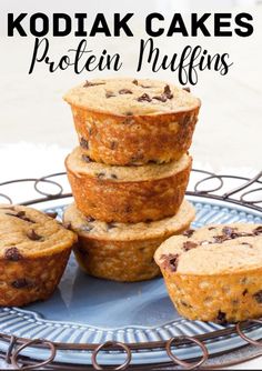 several muffins stacked on top of each other with text overlay that reads kodiak cakes protein muffins