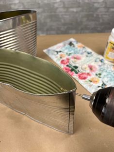 a tin can being used as a lamp shade