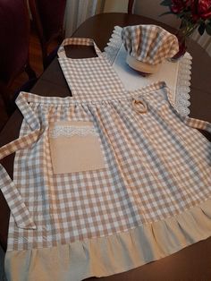 the apron is made out of plaid material