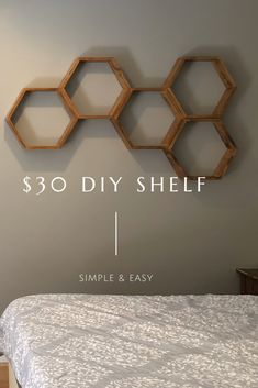 a bed with a white bedspread and wooden shelves above it that say $ 30 diy shelf simple & easy