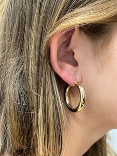 ➣ High quality 14K Yellow Gold 30mm 40mm Polished Hoop Earring with Hinged Closure, 5mm Thick, Tube Earrings, Thick Hoops, Real Gold Earrings ➣ MATERIAL: 14K Yellow Gold  ➣ Shape: Circle  ➣ Closure: Latch back   ➣ Solid / Hollow: Hollow  ➣Dimensions/ Weights:  30x5mm - 4.20g (pics & video showcasing this size)  40x5mm - 5.90g ◈ Please note that weights are approximate. ➣ SHIPPING: ◈ We always offer domestic FREE SHIPPING via USPS first class (3-5 business days)  ◈ We ship internationally, shipping costs are shown at checkout.     Please be aware that the buyer is responsible for any international customs & duties. ◈ Orders shipped from NYC usually within 24-48 hours from receiving payment.   ◈ All orders are packaged in a gift box at no additional cost. ➣ Return / Exchange policy: ◈ Your s Real Gold Earrings, Tube Earrings, Thick Gold Hoop Earrings, Shape Circle, College Stuff, Gold Vermeil Jewelry, Orders Shipped