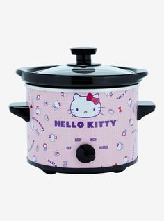 the hello kitty slow cooker is pink with black handles and features hello kitty on it