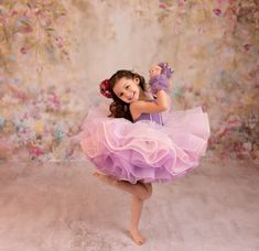 Our beautiful “Lavender Butterfly Confetti ” in short length – is full of swishy charm. This sweet ballerina length dress is the perfect addition to your next styled session. This dress features a silhouette made with our scrumptious lavender tulle with pastel dots scattered throughout. This particular fabric has been a client fave. Her bodice features a pleated bodice and hand sewn pearl detailing and 3D butterfly embellishments. We have added a very flexible back which features shoulder ties w Butterfly Confetti, Flexible Back, Lavender Butterfly, Virtual Background, Butterfly Embellishment, Petal Confetti, Custom Gown, 3d Butterfly, 3d Butterflies