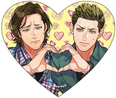 two young men making heart shapes with their hands