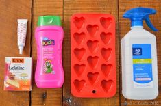 three plastic containers, one with heart shaped molds and the other with toothpaste