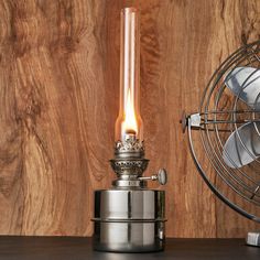 We’ve had such a great response to our Extra Bright Brass Oil Lamps (78A05.02) over the years that we’ve sourced for you a version in polished nickel. These are the same dimensions, style, and quality craftsmanship as the brass versions. These polished Nickel Oil Lamps are both 4" wide, but the Small Lamp is only 9" high, whereas the Large Lamp is 13". The fuel reservoir of the large lamp is larger as well, at two times the capacity of the small. What makes these particular lamps exceptional is Large Lamp, Lamps Aesthetic, Woodworking Shows, Oil Lantern, Large Lamps, Woodworking Supplies, Small Lamp, Backpacking Camping, Standard Lamps