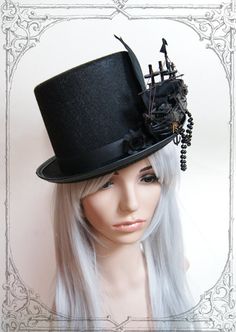 Elegant tophat for victorian ladies and gentlemen Steampunk Top Hat With High Crown For Themed Events, Gothic Winter Costume Hats And Headpieces, Vintage Top Hat With Curved Brim For Costume Party, Vintage Curved Brim Top Hat For Costume Party, Gothic High Crown Costume Hat For Cosplay, Black Gothic Hat For Costume, Gothic Black Brimmed Costume Hat, Black Gothic Hat For Cosplay, Black Gothic Mini Hats For Costume Party