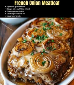 french onion meatloaf in a white casserole dish on a wooden table