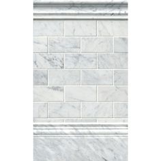 a white marble brick wall and floor