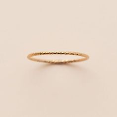 Add a little extra texture & shine to your stack. This cut dainty ring will help your stack stand out. Wear this piece in everyday stack or add it to a custom stack. Details:Location: Finger (order larger or smaller sizes depending on which finger you choose to wear it)Thickness: 1mmSizes: 5,6,7,8Style: Minimalist/DaintyMade with: 14K Gold Filled Dainty Ring, Stacking Ring, Stacking Rings, You Choose, Rose Gold Ring, Gold Filled, Gold Rings, Sparkle, Rose Gold