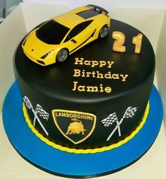 a birthday cake with a yellow car on top