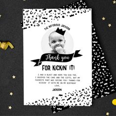 a black and white thank card for a baby's first birthday with confetti