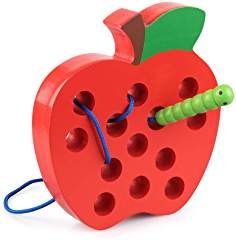 an apple shaped clock with a worm in it