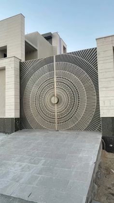 an intricately designed gate in front of a building